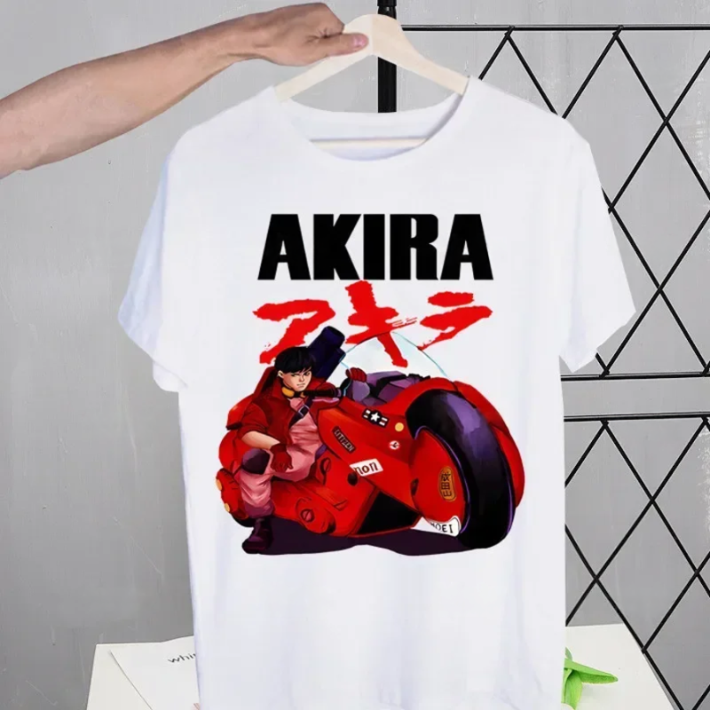 White t-shirt with 'AKIRA' graphic design featuring a character and motorcycle on a hanger.