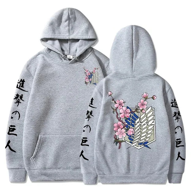 Gray anime streetwear hoodie with Attack on Titan Survey Corps emblem, cherry blossom design, and Japanese kanji text on sleeves.