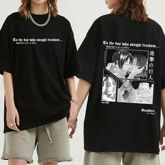 Black oversized Attack on Titan anime streetwear t-shirt with "To the boy who sought freedom" text on the front and emotional manga panel design of Mikasa and Eren on the back, Japanese urban fashion style.