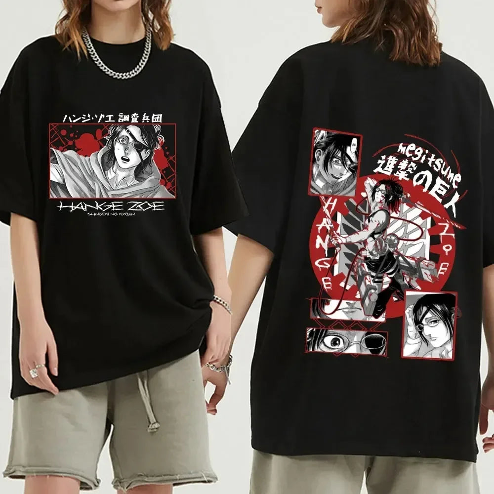 Black oversized Attack on Titan anime streetwear t-shirt featuring Hange Zoë graphic on the front and bold manga-style collage design with red accents on the back, Japanese urban fashion style.