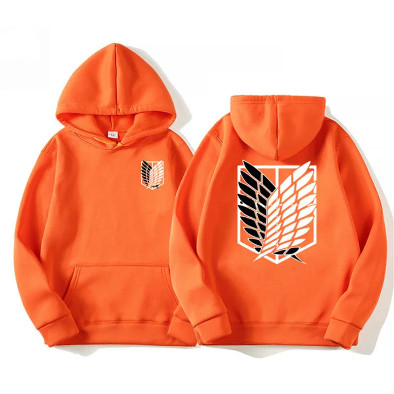 Anime streetwear orange hoodie with Attack on Titan Survey Corps wings emblem, Japanese urban fashion pullover.
