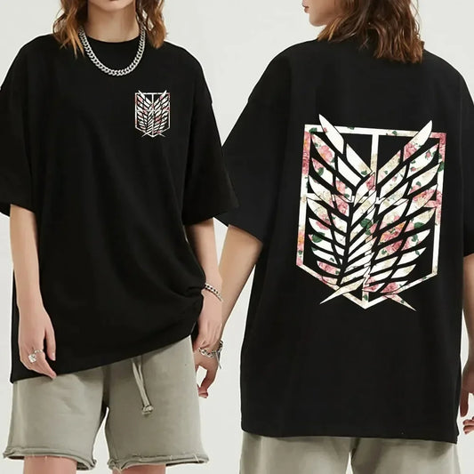 Black oversized Attack on Titan anime streetwear t-shirt with Survey Corps Wings of Freedom emblem and pink cherry blossom design on front and back, Japanese urban fashion style.