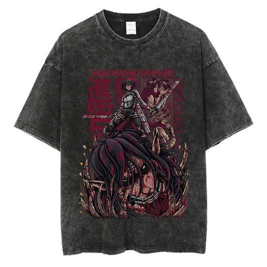 Black washed anime streetwear t-shirt featuring Attack on Titan Mikasa, Eren, and Armin graphic with bold red Japanese text in urban fashion style.